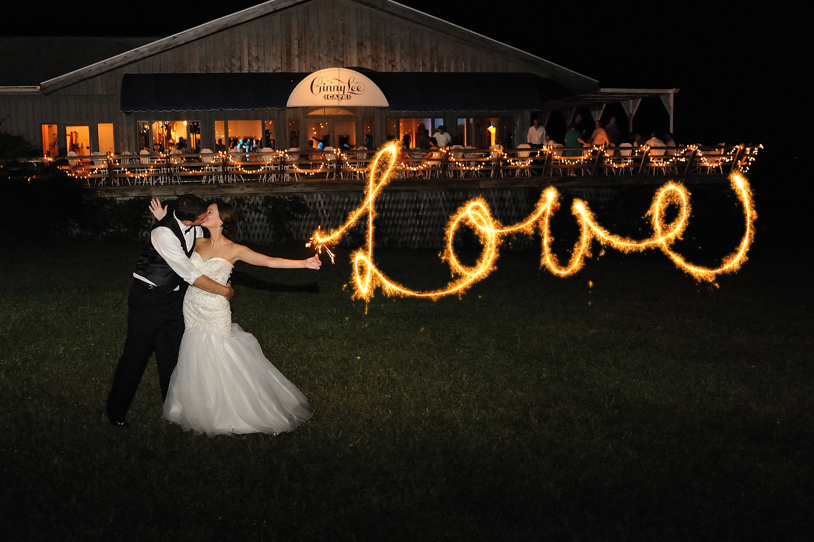 “Love” sparklers at the Ginny Lee Cafe at night – Photo credit Baker Photography